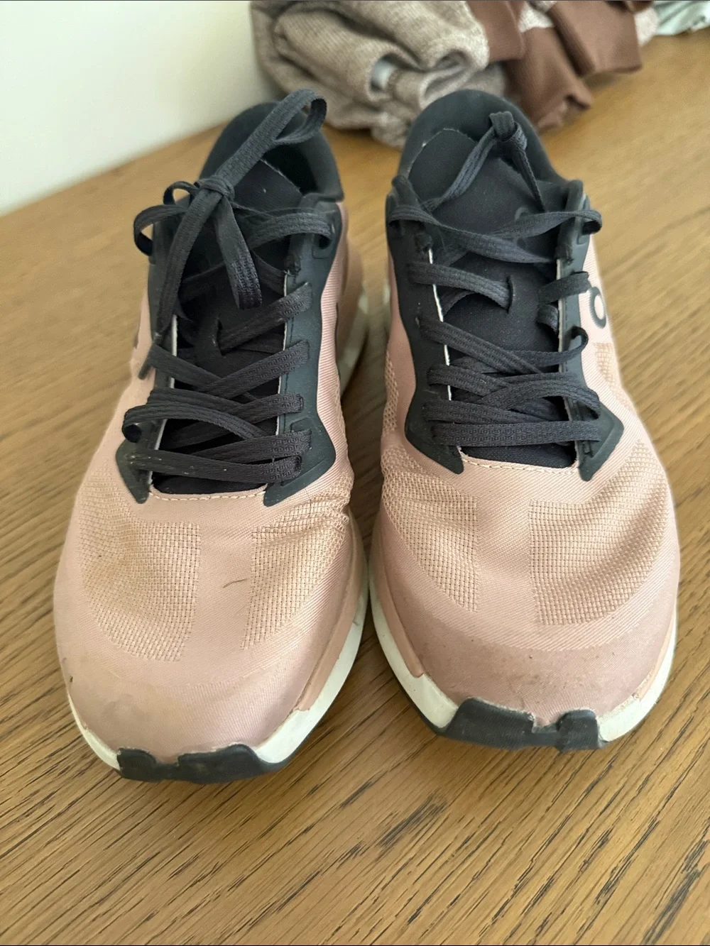 On Running Women’s Pink and Black Cloudsurfer Sneakers